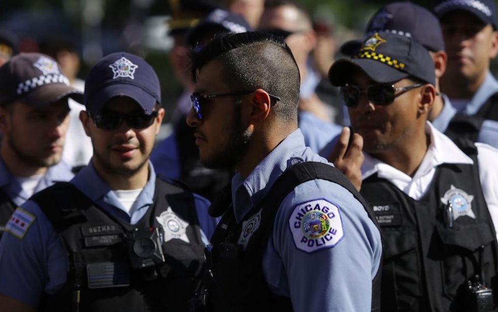 Chicago cops who point their guns must radio dispatchers about their actions starting next July