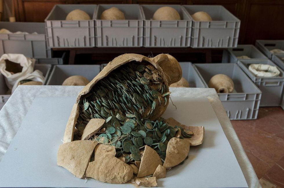 Hundreds of ancient gold coins discovered by workers building apartments in northern Italy
