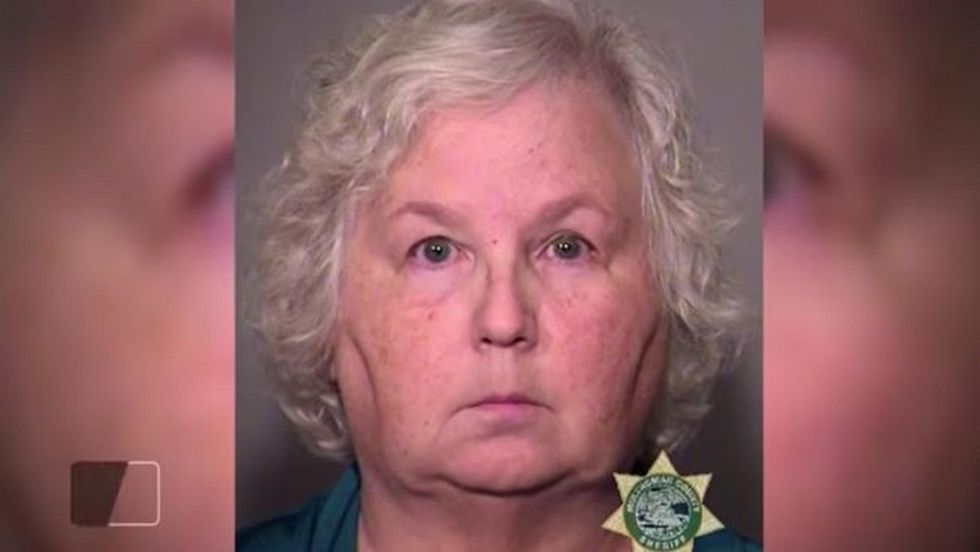 Romance novelist who wrote 'How to Murder Your Husband' essay charged with murdering her husband