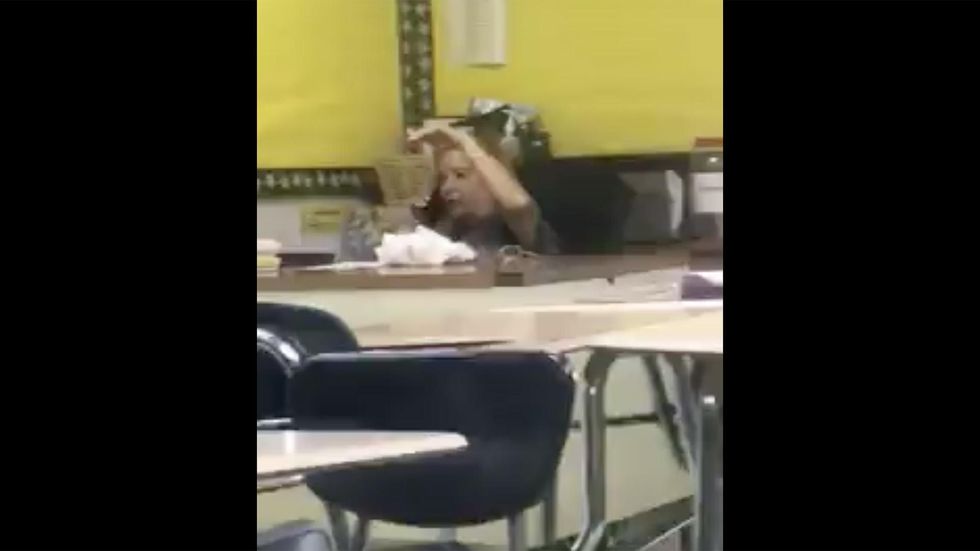 Viral video shows teacher on the phone during class time. Now she's under investigation.