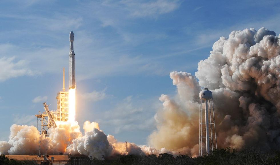 Elon Musk's SpaceX announces first round-the-moon passenger flight in a tweet