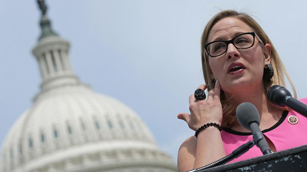 Arizona US Senate Dem candidate Kyrsten Sinema criticized for anti-war flyers from the early 2000s