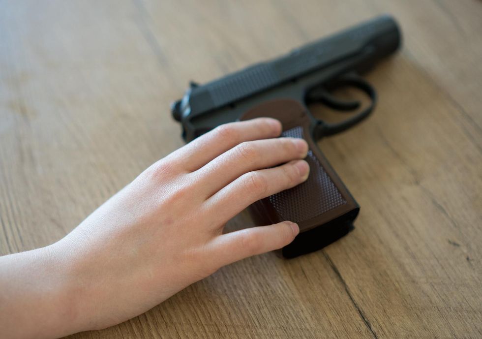 Second-grader shoots self in hand at school with dad's gun -- now dad is in serious trouble