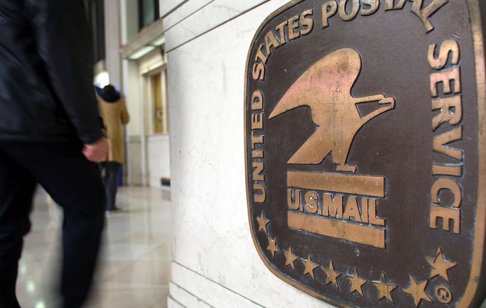 College students don't vote absentee because 'they don't know where to get stamps': county official