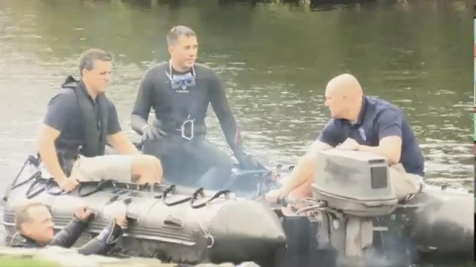 Officers practicing diving drill with mannequin get a whole lot more than they bargained for