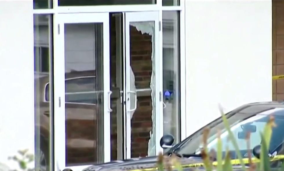 Hero cop 'ran toward the danger,' kills gunman who opened fire at municipal building; four wounded