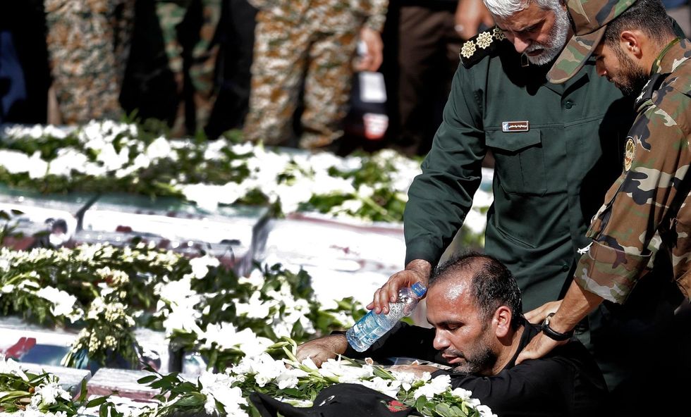 Iran blames US and Israel for attack on military parade, vows 'crushing and devastating' response