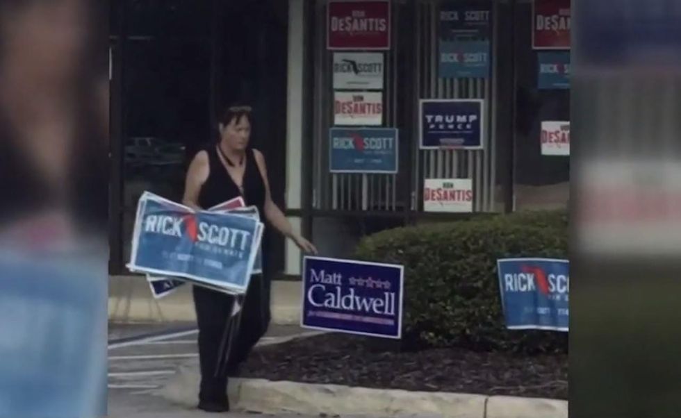 HS teacher caught on video taking Republican campaign signs from outside local GOP headquarters