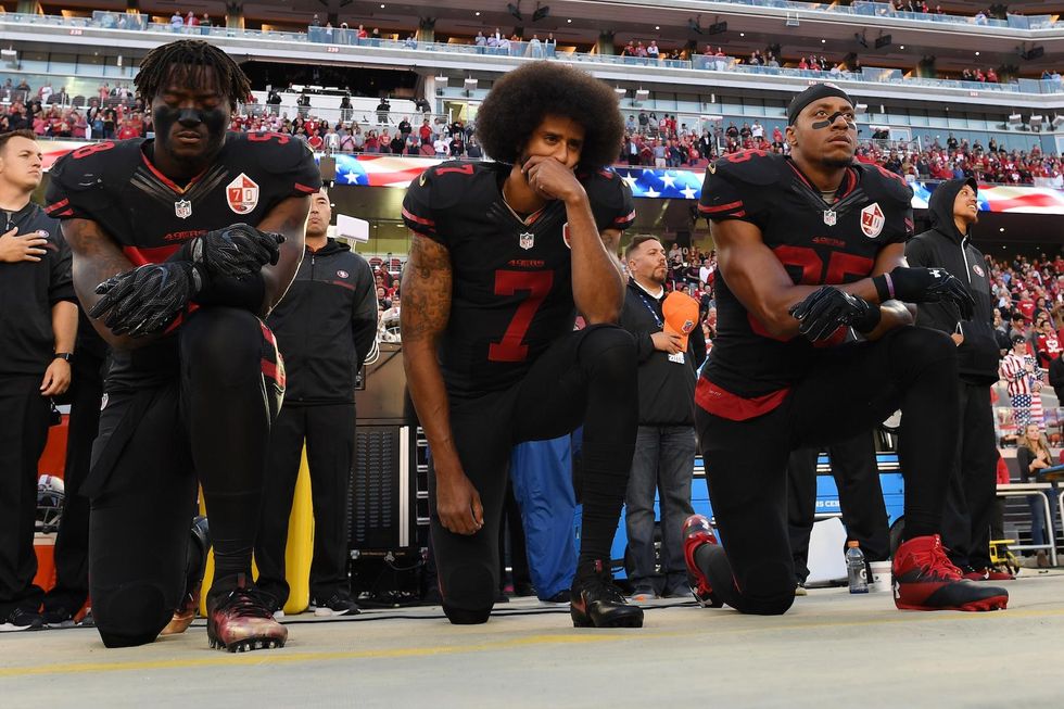 Protesting player back in the NFL after accusing the league of colluding to keep him out
