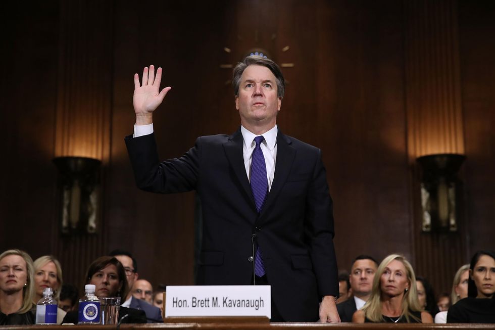 Man claims Kavanaugh threw beer in man's face during bar fight. Then the police report is released.