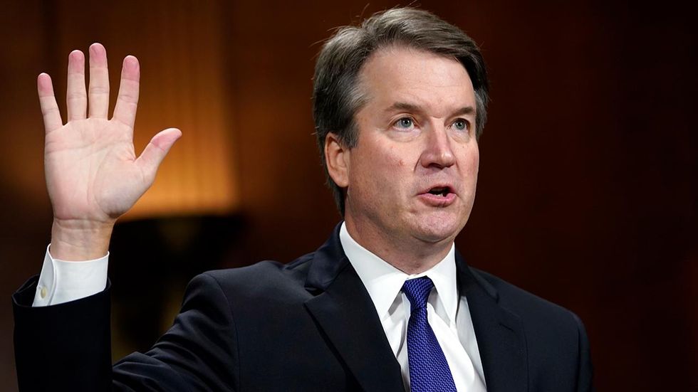 Kavanaugh sworn in as Supreme Court justice just hours after 50-48 confirmation vote by Senate