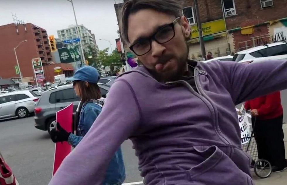 Cue violins: Creep who 'roundhouse-kicked' pro-life woman arrested, charged with 8 counts of assault