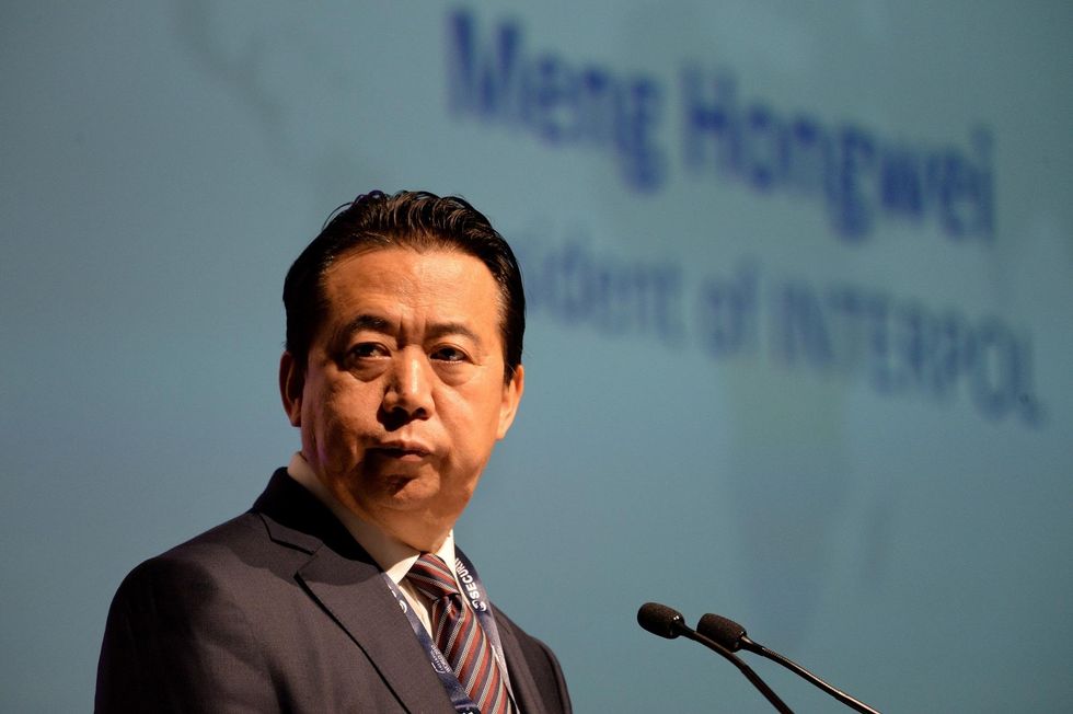China admits detaining missing Interpol chief, accuses him of bribery