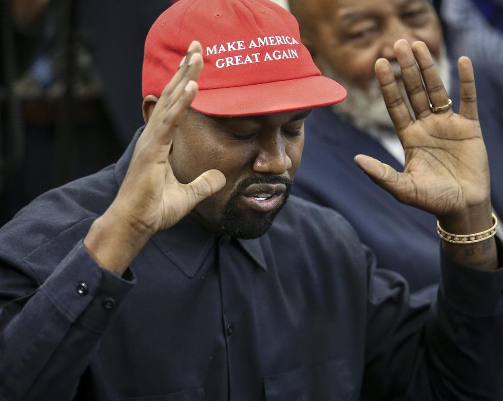 Kanye West jumped on an Apple Store table to talk about Trump after leaving the White House