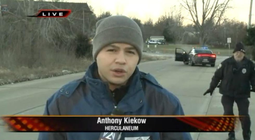 Police Officer Realizes He's Been Caught on Live TV. His Reaction Is Priceless.