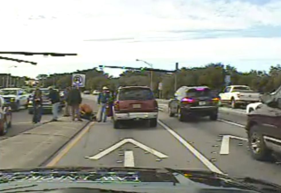 That's My Dad!': Dashcam Captures Heartbreaking Moment a Cop's Daughter Finds Him Injured on the Road