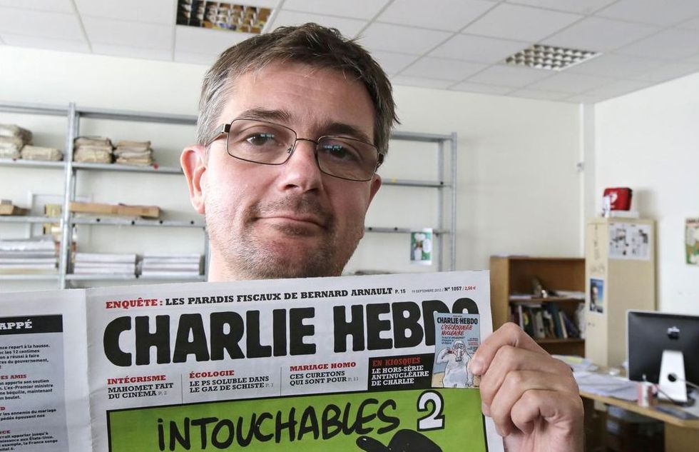 The First Charlie Hebdo Cover Since Deadly Terror Attack Is Being Called 'Perfect' and 'Beautifully Subversive