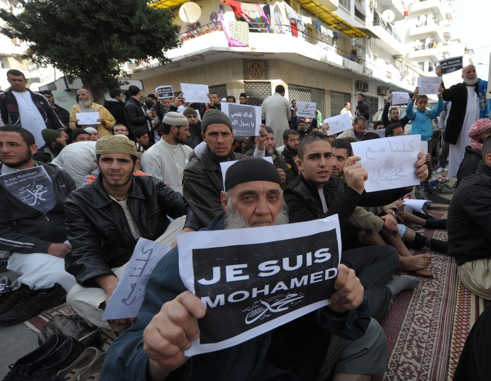 PHOTOS: Muslims Around the World Burn Flags, Clash with Police During Protests Against Latest Charlie Hebdo Issue