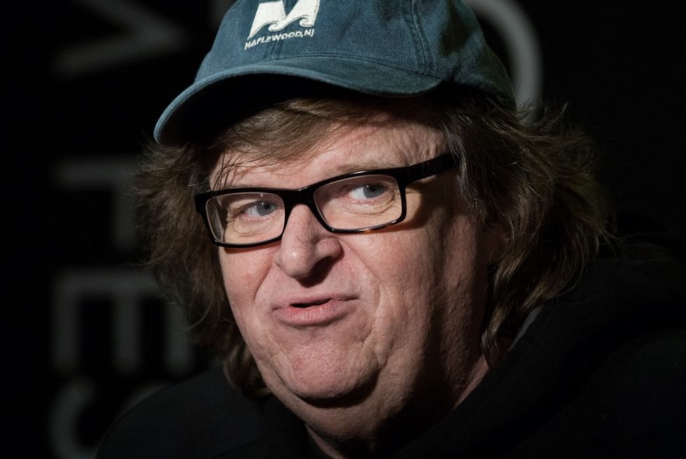 Michael Moore Reloads With 'Sniper' Tweet Barrage: 'What Would Jesus Do?...Hide on Top of a Roof and Shoot People in the Back!