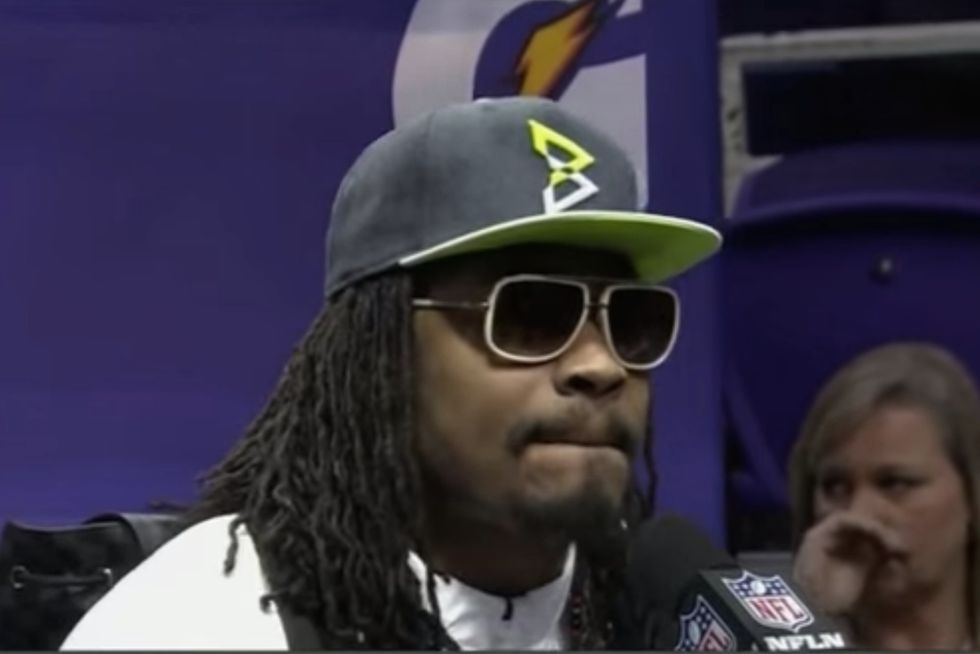 When NFL Running Back Marshawn Lynch Showed up to Super Bowl Media Day, He Had a Plan to Stick It to the NFL. It Involved These Same Eight Words Over and Over Again.