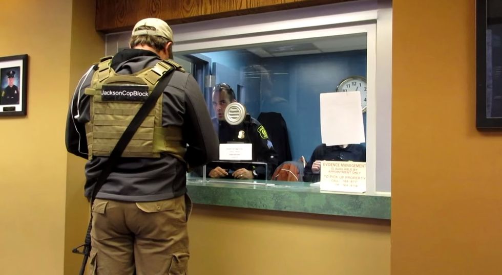 Caught on Video: See How Officers React When Man Openly Carries AR-15 Into Police Station
