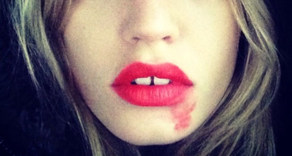 Why You Might Start Seeing Women Upload Pictures Online With Smeared Lipstick
