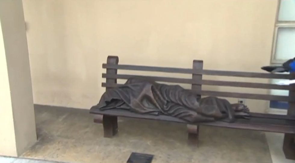 Statue of Man Sleeping on Bench Often Draws Double Takes When People See His Feet, Realize Who He Is