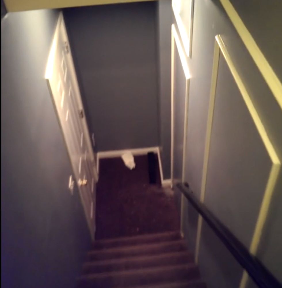At the Bottom of This Man's Stairs Is a Secret Door. Touch It, and Something Awesome Happens.