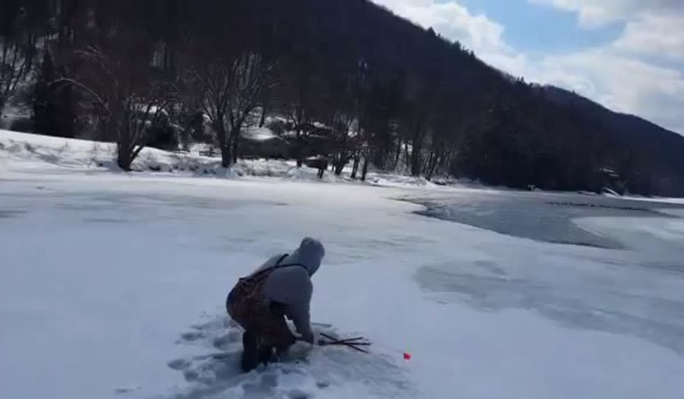 These Ice Fishermen Expected to Reel in a Fish. 34 Seconds Into the Video They Get Something Completely Unexpected.