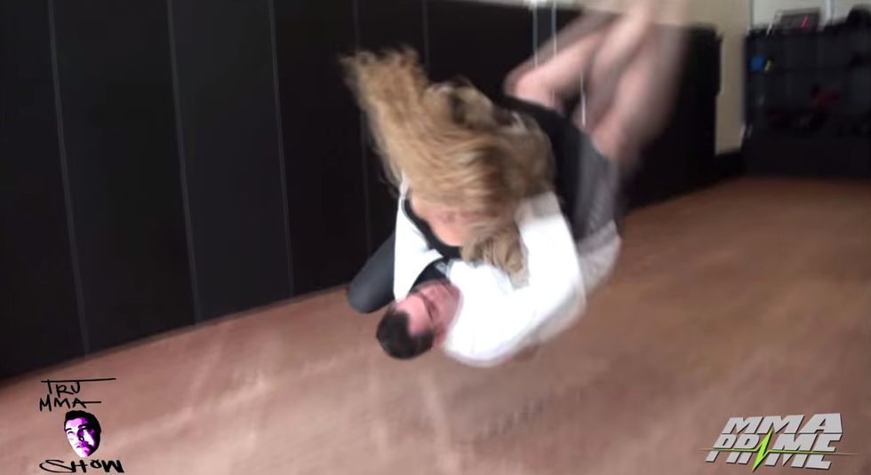Guy tells UFC's Ronda Rousey she doesn't have the 'strength' to compete with a man — then learns brutal lesson