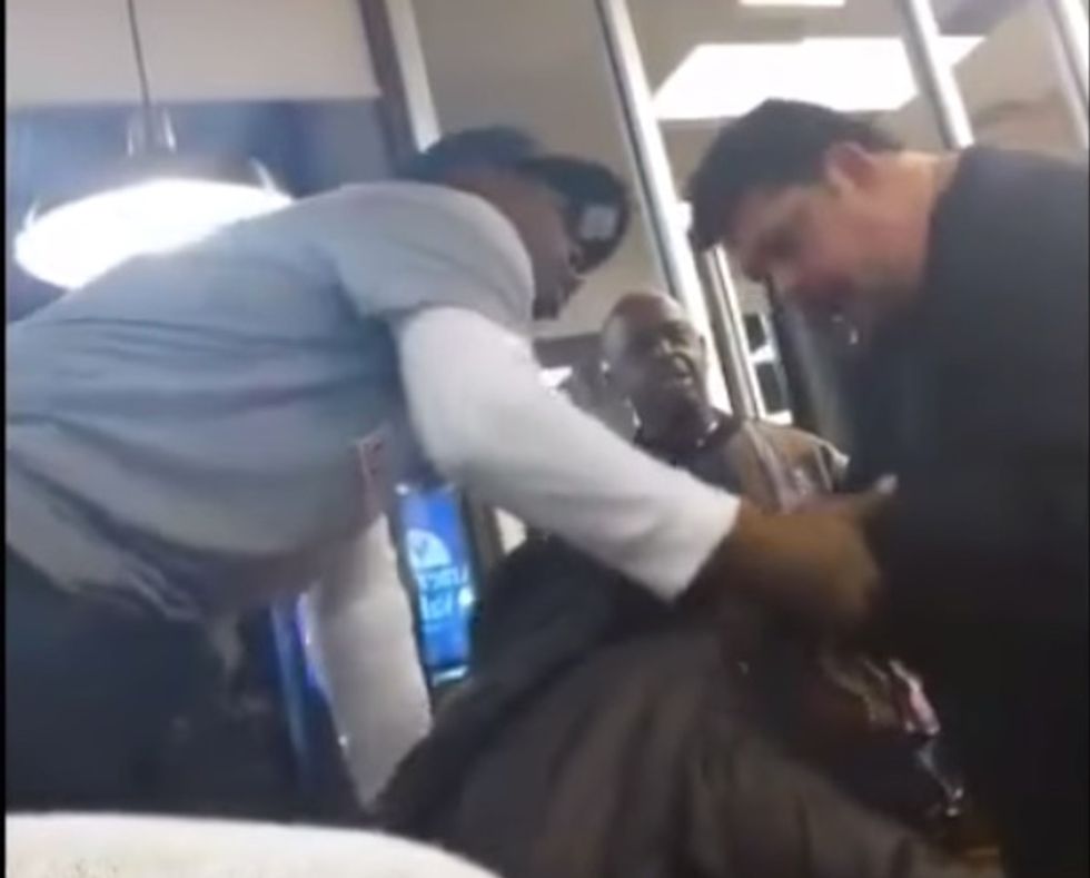 Guy Allegedly Puts His Hands on Woman Inside Restaurant — That's When This Very Large Man Got Up From His Table
