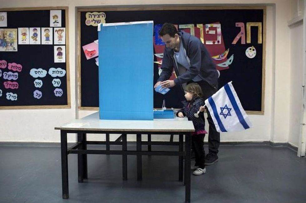 Exit Polls Show Extremely Tight Contest for Israeli Prime Minister Netanyahu