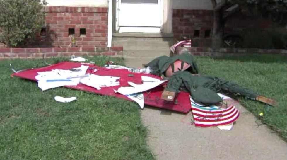 That Needed to Come Down': Man Rips Up Neighbor's Swastika Display
