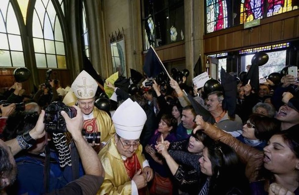 They Had to Call Out the Riot Police to Protect This Man Who Was Just Ordained a Catholic Bishop — Because He's Accused of a Disgusting Crime