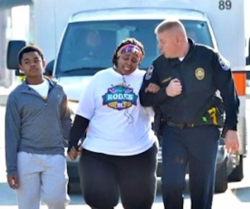 Encounter With Cop Ends in Tears, Smiles and Viral Photo
