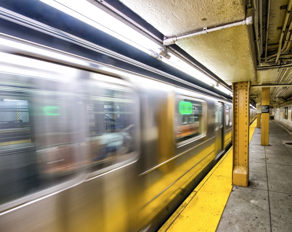 Whoa!': Look Closely at This Photo of Three Kids Dangerously Hitching a Subway Ride. Do You See the 'Creepy' Image Beneath Them?