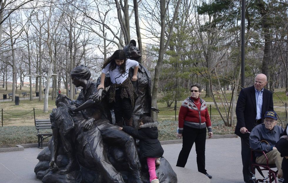 Check Out This Photo of Kids Playing on Vietnam Women's Memorial: Disrespectful, or Just Kids Being Kids? (Poll)