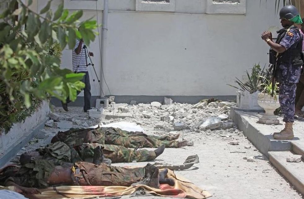 Somali Special Forces Take Photos of Dead Jihadists After Breaking 12-Hour Siege. At Least 24 Believed Dead. (GRAPHIC)