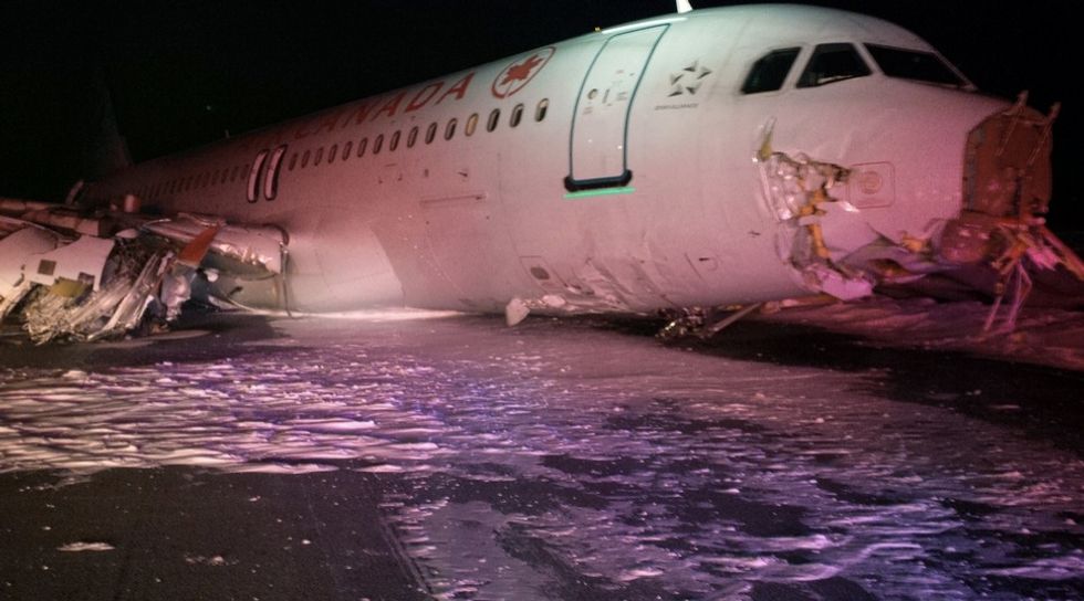 Hard Landing Short of Runway Slices Off Passenger Jet's Nose Cone, Landing Gear and an Engine; 25 Hospitalized