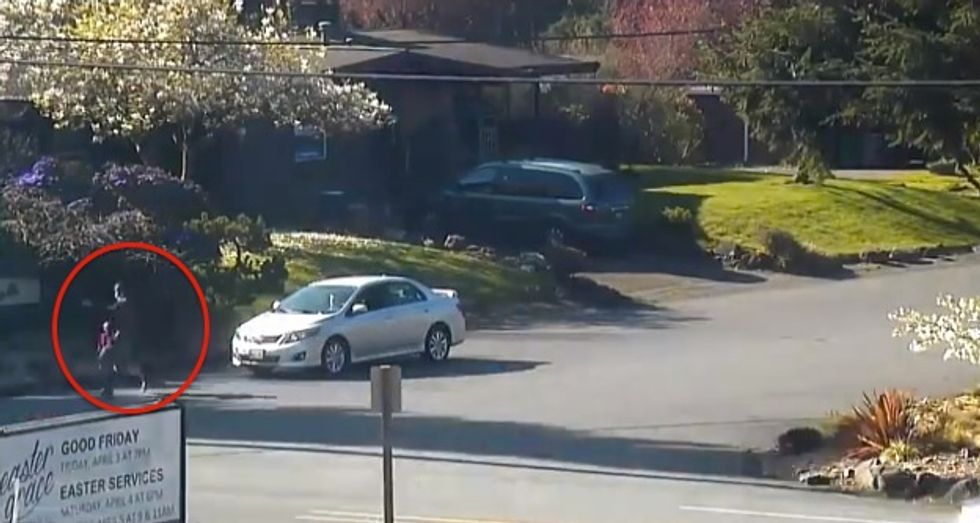 A 4-Year-Old Was About to Run Into a Busy Intersection. Surveillance Video Shows the 'Miraculous Action' That Happened Instead