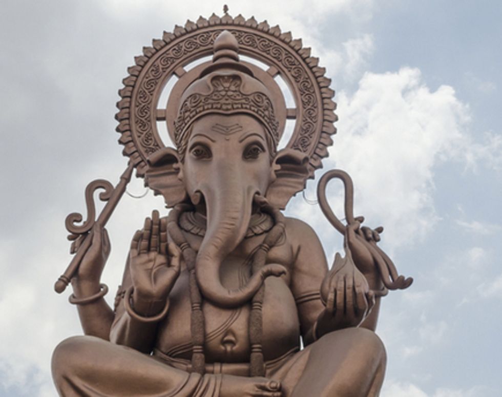 She's Only Four Days Old. But There's Something About This Infant's Deformed Face That Has Crowds Flocking to Worship Her.