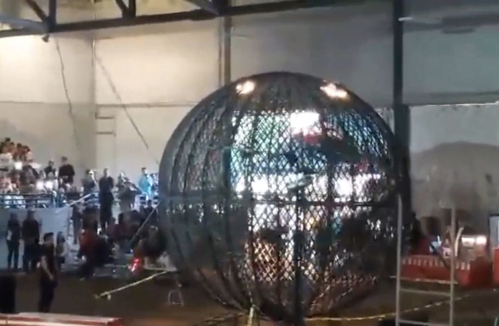Listen to the Audience's Horrified Gasps as Three Motorcyclists' Act Goes Wrong Inside the 'Globe of Death' 
