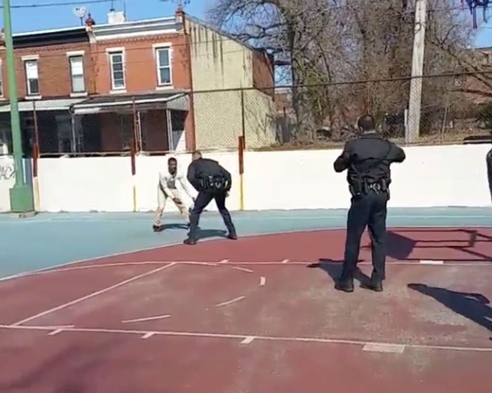 Two Uniformed Cops Challenge Young Man to Game of Basketball — Video Shows Who Easily Won