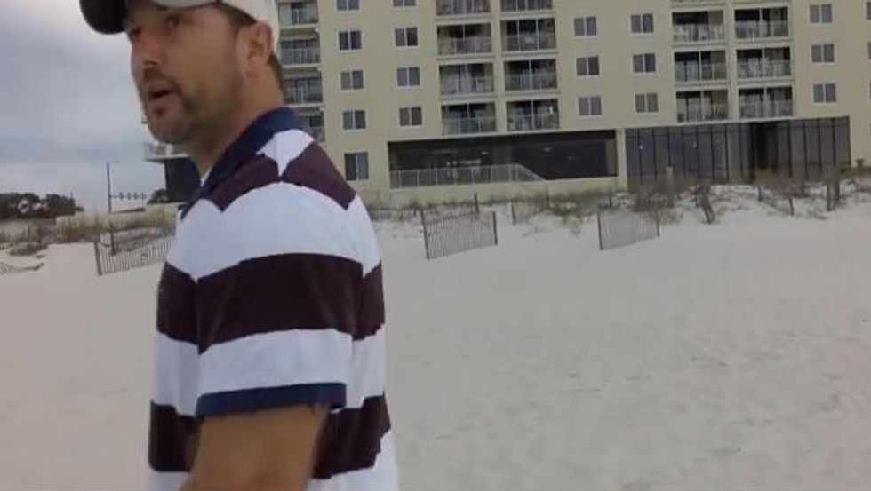 Tense Video Shows the Moment a Man Is Confronted for Flying His Drone on a 'Public Beach': 'You've Been Told