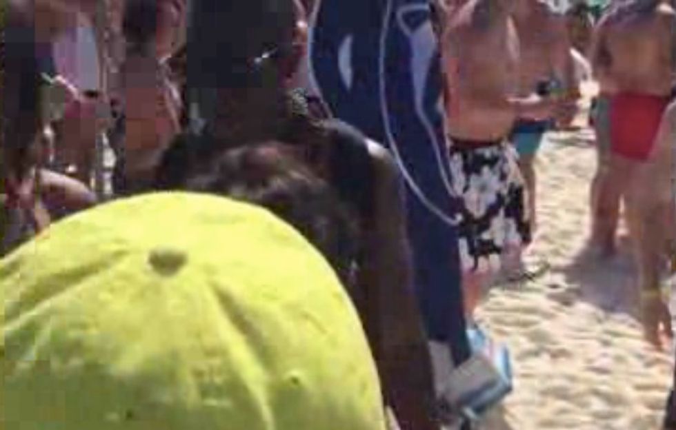 Disgusting, Sickening': Sheriff Says Video Shows Spring Break Revelers Watching Apparent Gang Rape Take Place on Crowded Beach; Two Students Charged