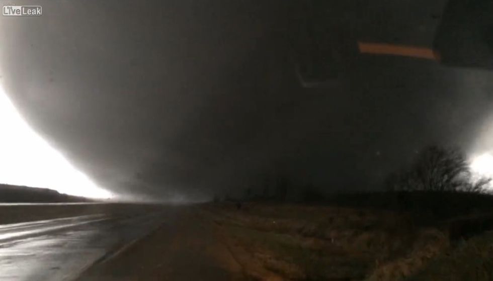 'It Is Coming Right Over the Top of Me': Driver Records Video of Deadly Tornado — and It Gets Just a Little Too Close for Comfort