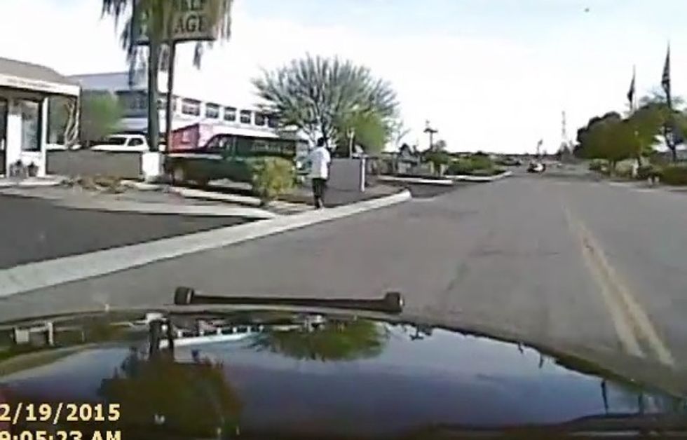 Intense Dash Cam Footage Shows Police Cruiser Ram Into Armed Crime Spree Suspect: 'Man Down!