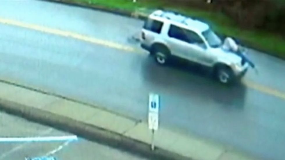 Driver Arrested After SUV Speeds Through Seven Towns With Man on the Hood