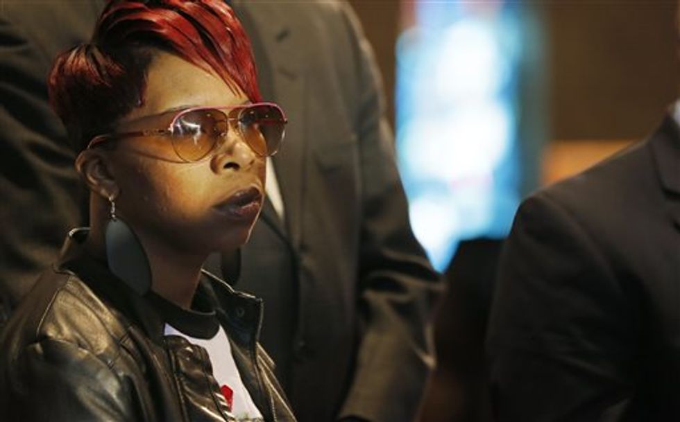 Michael Brown's Family Files Wrongful-Death Lawsuit Against City of Ferguson
