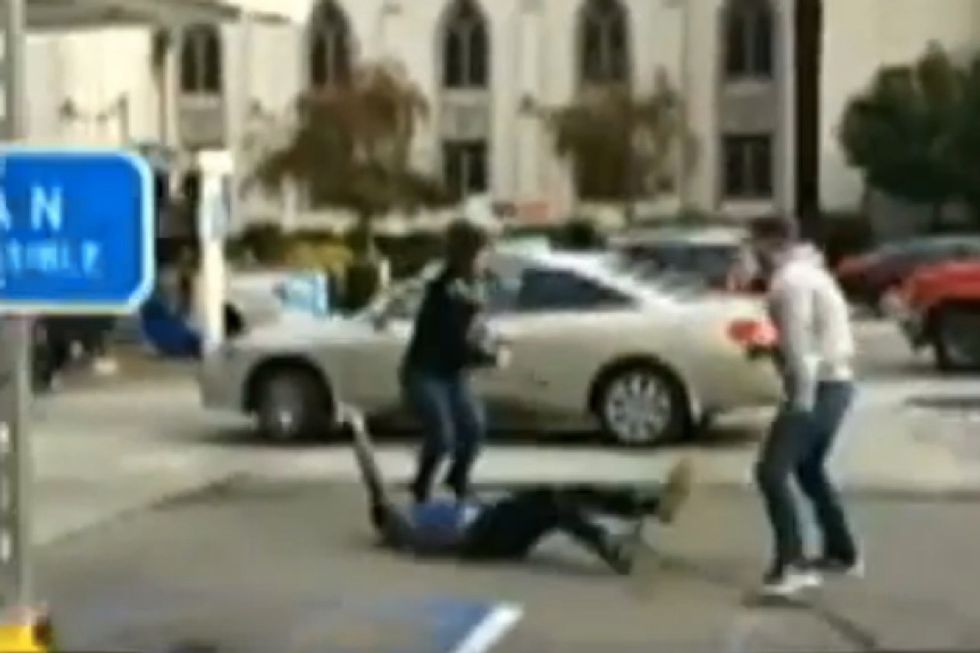 Woman Allegedly Stabbed in Neck During Parking Lot Attack. But Her Boyfriend Settles the Matter With Just One Punch.
